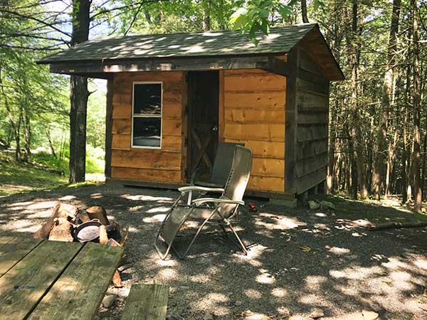 cabin camping in the woods